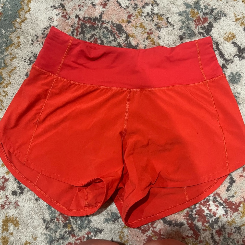 Carnation red speed up shorts